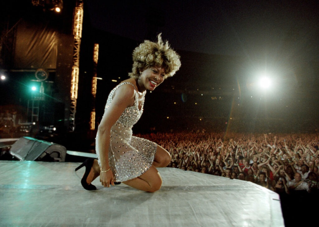 Tina Turner on stage during her concert at Wembley Stadium in London, England, as part of her Wildest Dreams World Tour, 20th July 1996. Commencing in the spring of 1996 The Wildest Dreams Tour would last for 16 months, and included more than 250 concert dates in Europe, North America and Australasia. (Photo by Duncan Raban/Popperfoto via Getty Images)