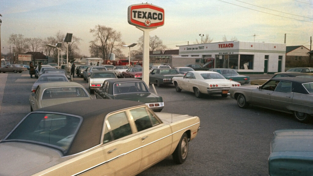 Motorists line up at a gas station on New York's Long Island, hoping to fill their tanks during the gasoline shortage of 1973-74. Long lines and fuel restrictions were common across the country.
