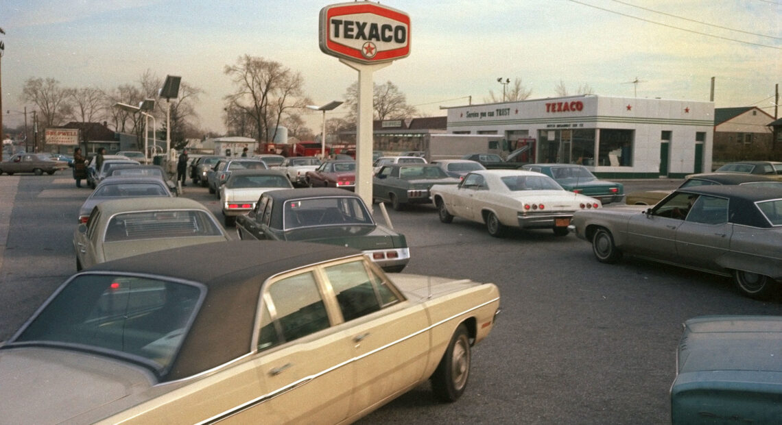 Motorists line up at a gas station on New York's Long Island, hoping to fill their tanks during the gasoline shortage of 1973-74. Long lines and fuel restrictions were common across the country.