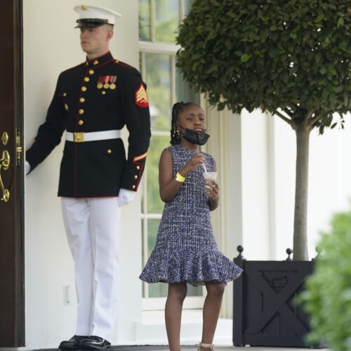 Gianna Floyd, George Floyd's daughter, walks out of the West Wing door at the White House after meeting Tuesday with President Biden and Vice President Harris. CREDIT: Evan Vucci/AP
