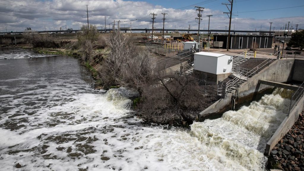 Treated Denver wastewater flows into the South Platte River in April. In what may be the largest U.S. project of its kind, Denver will use excess energy from sewage wastewater to heat and cool a new agriculture, arts and education center. CREDIT: Hart Van Denburg/CPR News