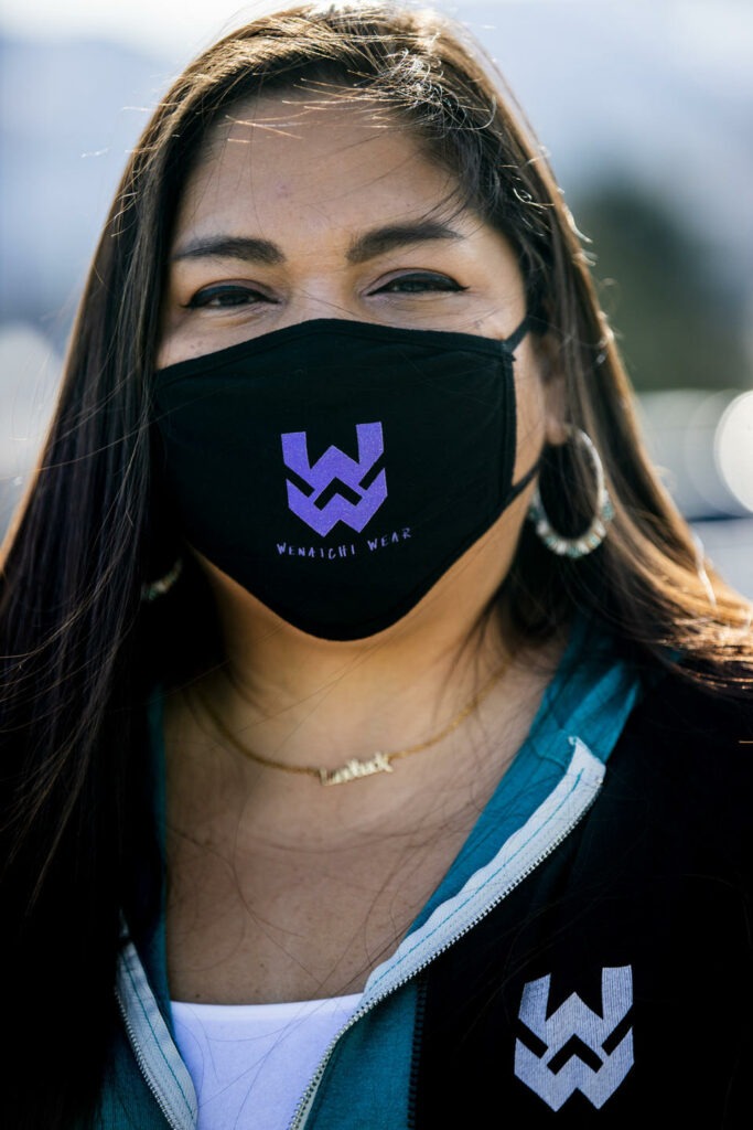 Co-founder of R Digital Design and Wenatchi Wear, Mary Big Bull-Lewis outside of her warehouse in Wenatchee on March 2, 2021. Through her designs, she educates people about the Wenatchi tribe’s history. “It’s about educating people and letting them know Native Americans are still here, despite all the efforts to eliminate us,” Big Bull-Lewis says. CREDIT: Dorothy Edwards/Crosscut