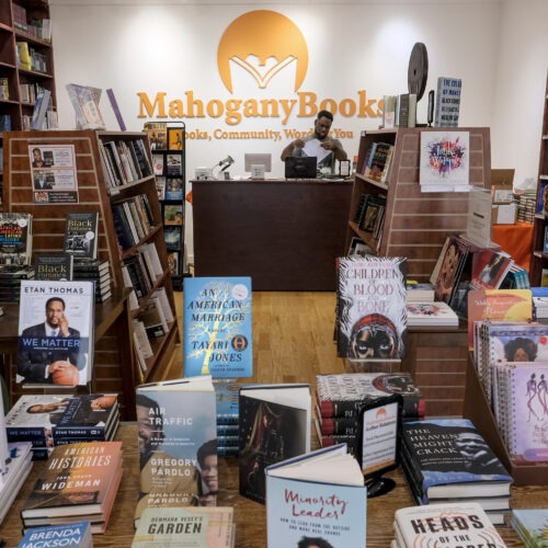 Derrick Young, co-owner of Mahogany Books in Washington, D.C., says his store has seen new customers in the last year who seem to be "willing to do the work" to educate themselves on issues of race in America. Bonnie Jo Mount/Getty Images