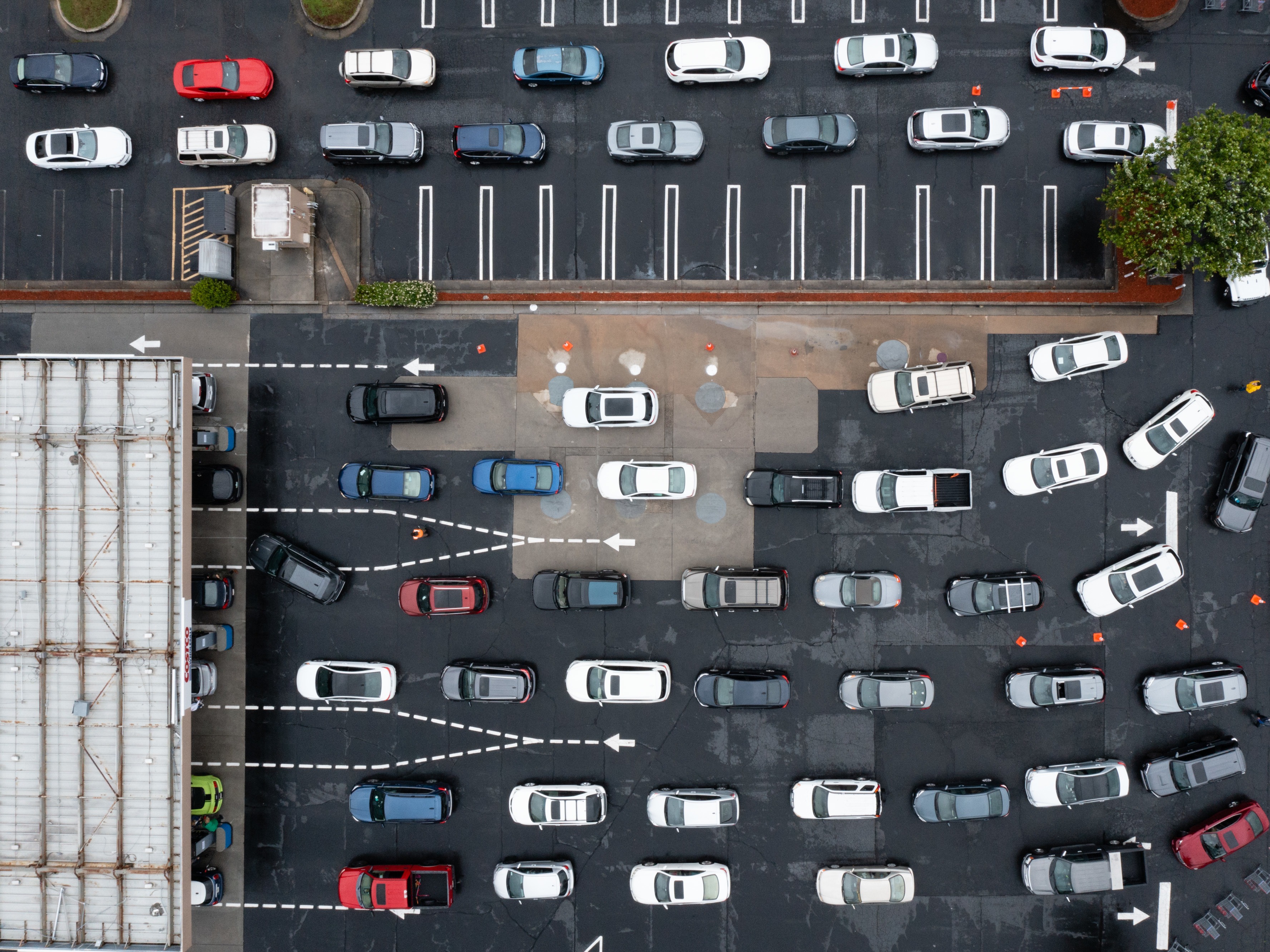 Drivers wait to refuel vehicles Wednesday at a Costco Wholesale Corp. gas station in Dunwoody, Ga. Officials are urging people not to panic-buy as motorists in Southeastern states put a run on gas stations. Elijah Nouvelage/Bloomberg via Getty Images