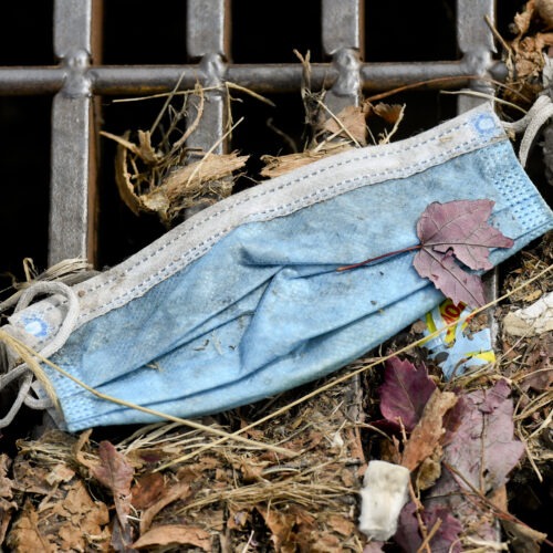 A discarded disposable face mask on a storm sewer grate along with other detritus on Penn Ave in West Reading September 14, 2020. (Photo by Ben Hasty/MediaNews Group/Reading Eagle via Getty Images)