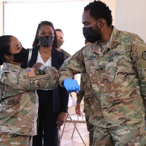 Maryland National Guard Brig. Gen. Janeen Birckhead greets soldiers last week at a mobile vaccine clinic in Wheaton, Md.