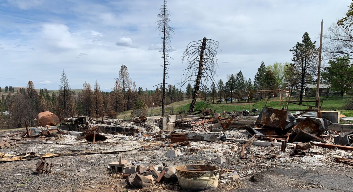 The cleanup of toxic debris has been slowed in Malden Wash. after former President Trump held up aid as part of a political dispute with the state's Democratic governor. Kirk Siegler/NPR