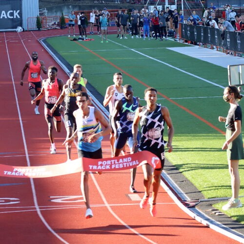 Donavan Brazier breaks the tape in an 800 meter tune-up race in Portland on May 29, ahead of the U.S. Olympic Track and Field Team Trials, which begin later this week.