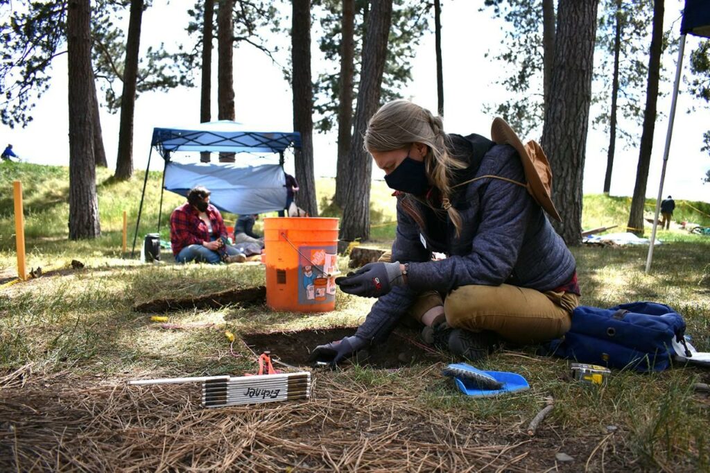 University of Idaho graduate student Kristina McDonough explores the grounds of Fort Sherman in Coeur d'Alene.