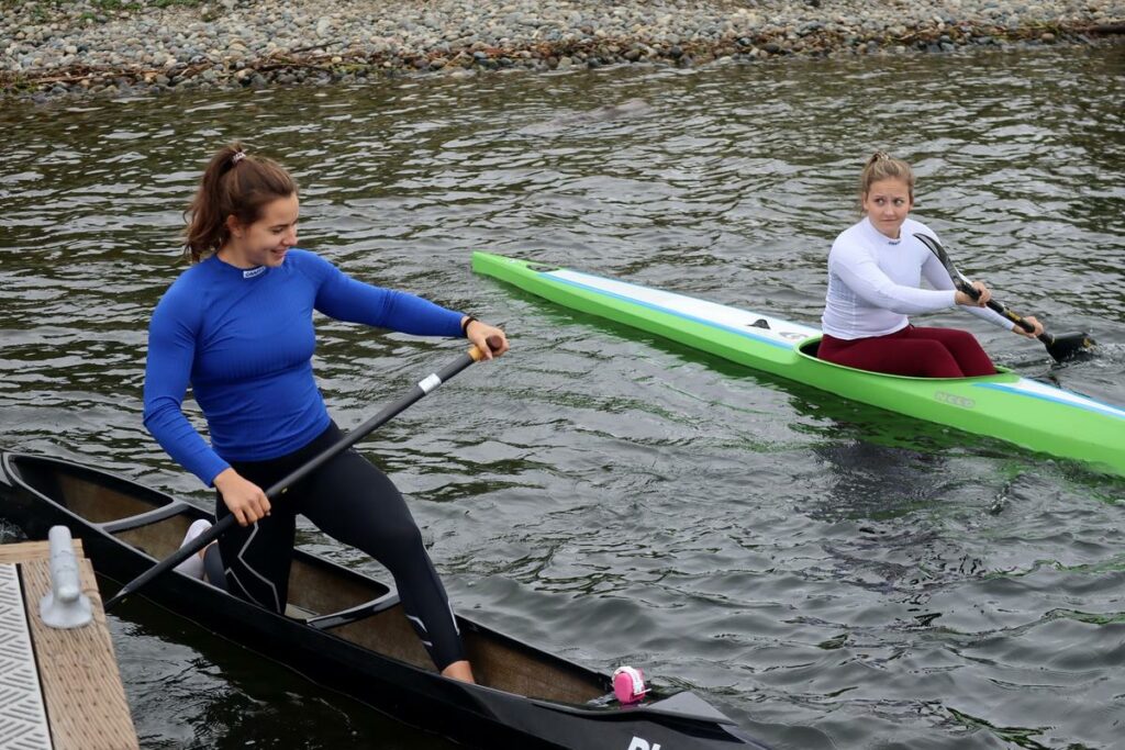 Sprint canoeist Nevin Harrison, left, and kayak racer Anna McGrory head out for a workout in Seattle on May 21, 2021. CREDIT: Tom Banse/N3