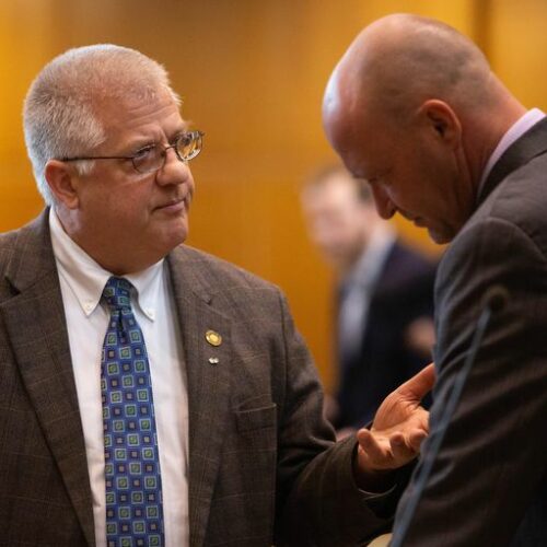 Rep Mike Nearman, R-Independence, chats with fellow representatives on the House floor on April 11, 2019, at the Capitol in Salem, Ore.