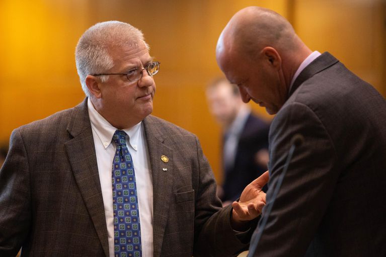 Rep Mike Nearman, R-Independence, chats with fellow representatives on the House floor on April 11, 2019, at the Capitol in Salem, Ore.