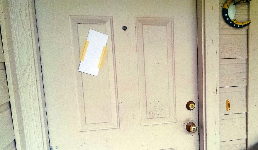 File photo of a posted rental eviction notice. Washington Gov. Jay Inslee has put a revamped eviction moratorium, with some exceptions, in place until Sept. 30. The current ban was set to expire on June 30, 2021. CREDIT: Flickr/Rental Realities/ CC By 2.0