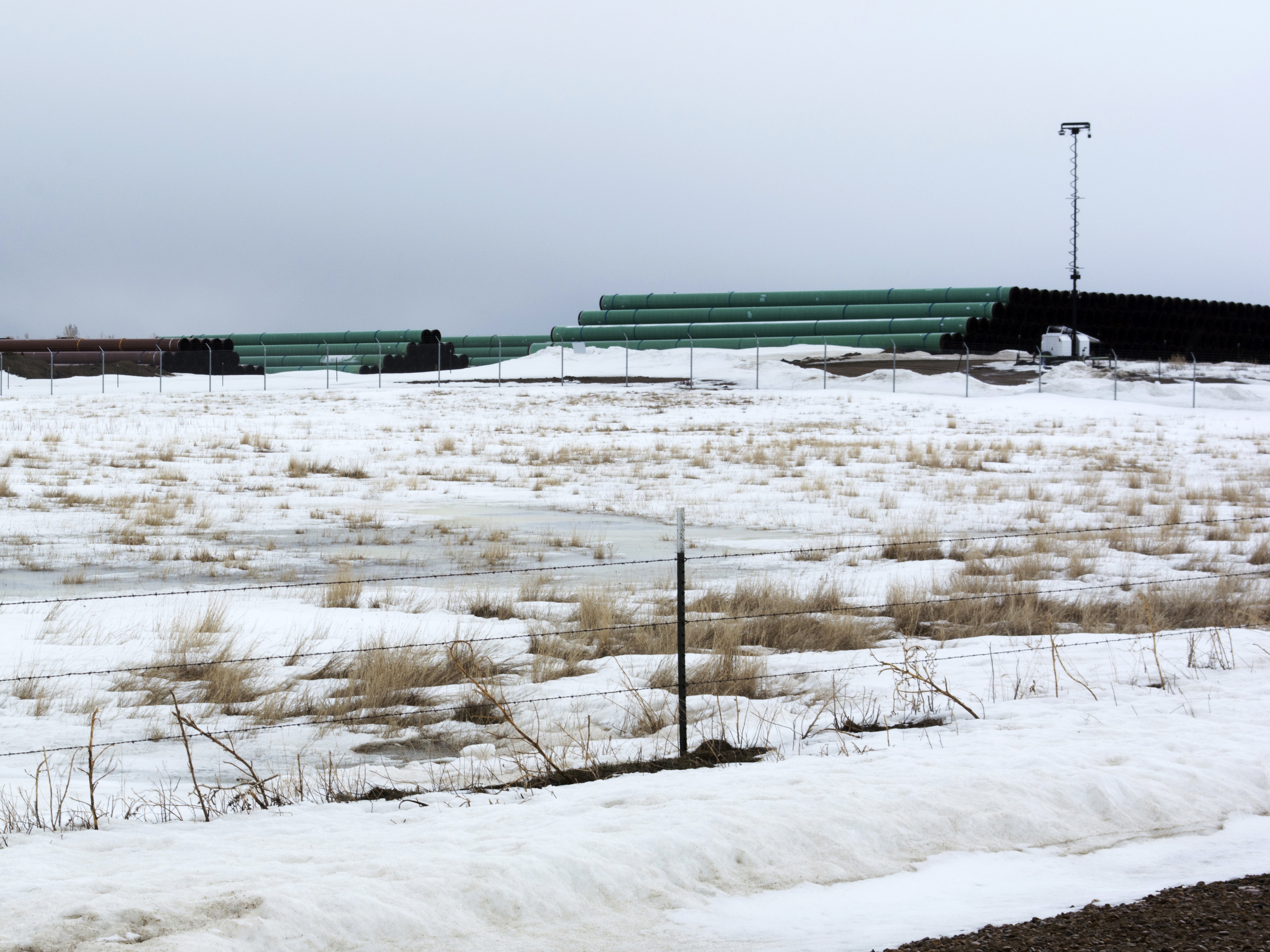 A storage yard is seen in Montana for pipe that was to be used in the construction of the Keystone XL oil pipeline. The developer has now canceled the controversial project. Al Nash/Bureau of Land Management via AP