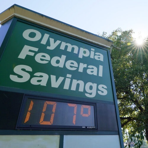 A display at an Olympia Federal Savings branch shows a temperature of 107 degrees Fahrenheit on Monday in the early evening in Olympia, Wash. CREDIT: Ted S. Warren/AP