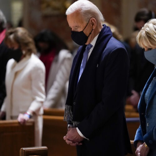President Joe Biden and his wife, Jill Biden, shown here on Jan. 20, 2021, attend Mass at the Cathedral of St. Matthew the Apostle during Inauguration Day ceremonies in Washington, D.C. CREDIT: Evan Vucci/AP