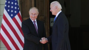 Russian President Vladimir Putin and President Biden shake hands during their meeting at the Villa la Grange in Geneva on Wednesday. CREDIT: Alexander Zemlianichenko/AP