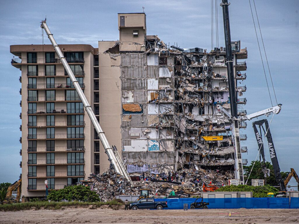 Search and Rescue teams look for survivors in the partially collapsed 12-story Champlain Towers South condo building on June 30, 2021 in Surfside, Fla. Four more bodies were found on Wednesday. Giorgio Viera/AFP via Getty Images