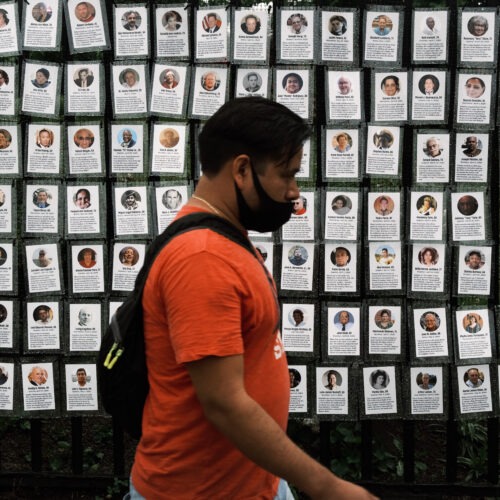 Memorials hang from the front gate of Greenwood Cemetery during an event and procession organized by Naming the Lost Memorials to remember and celebrate the lives of those killed by the COVID-19 pandemic in New York City. Spencer Platt/Getty Images