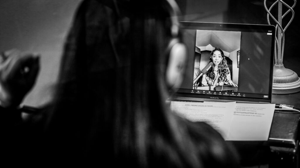 Photo of Sueann Ramella (left) and a virtual Esmy Jimenez during a recording of 'Traverse Talks.'