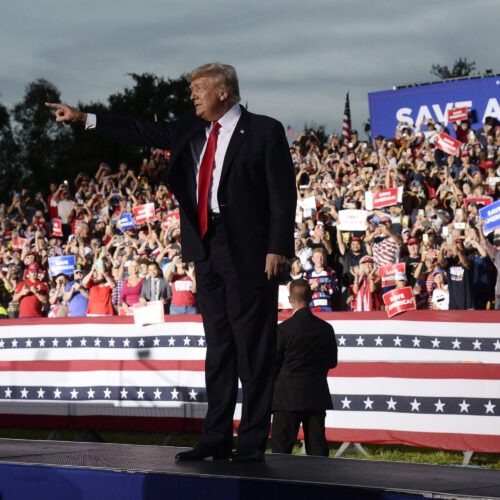 Former President Donald Trump has announced that he is suing three of the country's biggest tech companies: Facebook, Twitter and Google's YouTube. Here, he walks onstage during a rally on July 3 in Sarasota, Fla. CREDIT: Jason Behnken/AP