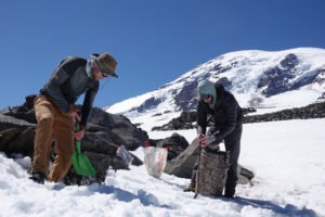Photo of researchers on the icey mountain.