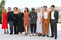 Jury members Mylène Farmer, Kleber Mendonça Filho, Maggie Gyllenhaal, Jessica Hausner, Mati Diop, jury president Spike Lee, jury members Mélanie Laurent, Tahar Rahim and Song Kang-ho attend the Jury photocall during the 74th annual Cannes Film Festival on July 6, 2021, in Cannes, France. Kate Green/Getty Images