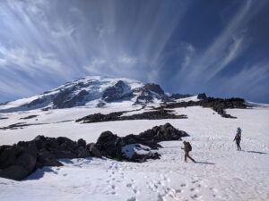 Ice worm researchers Scott Hotaling and Peter Wimberger led a trip to study life on the glaciers of Mount Rainier in June. For a long time, Hotaling says, biologists have written off high-altitude glaciers as sterile, lifeless places. But that's no longer. Jordan Boersma