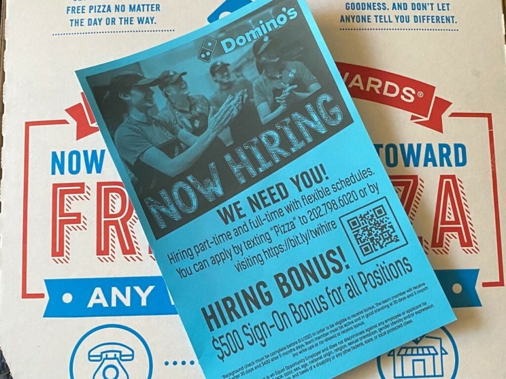 In need of workers, a Domino's franchise in Washington, D.C., is offering a sign-on bonus for all positions. CREDIT: Andrea Hsu/NPR