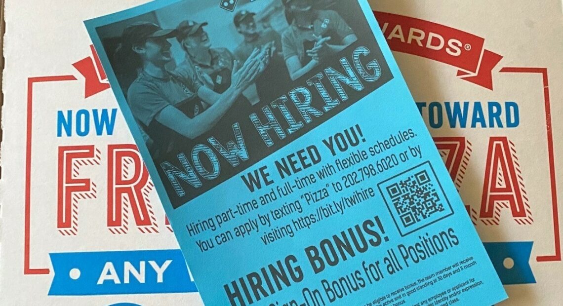 In need of workers, a Domino's franchise in Washington, D.C., is offering a sign-on bonus for all positions. CREDIT: Andrea Hsu/NPR