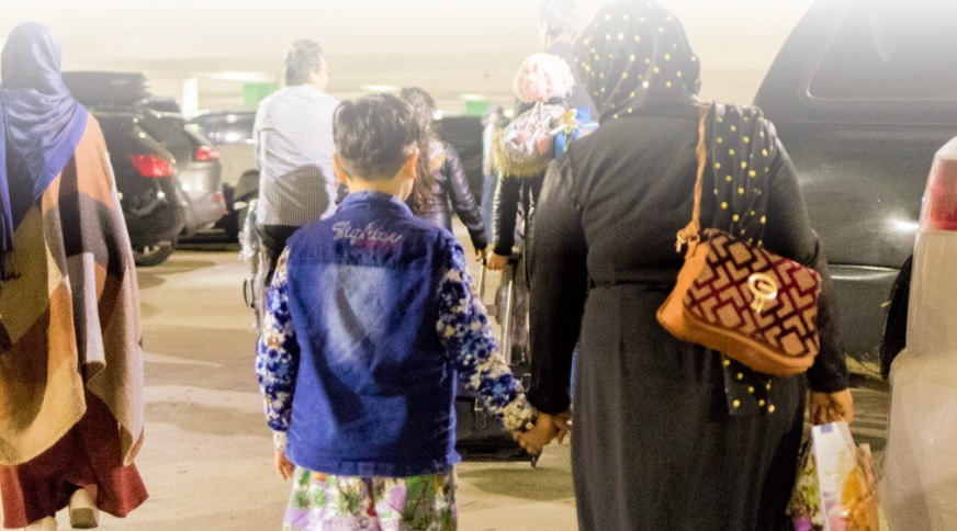 Image of parents and children Afghan refugees