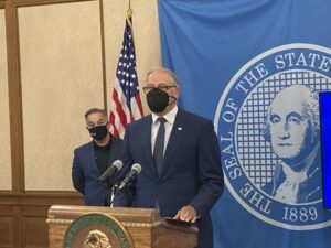 At a news conference on October 14, Gov. Jay Inslee said the state was following science and the law when deciding whether to accommodate employees who received medical or religious exemptions to his COVID-19 vaccine mandate.
