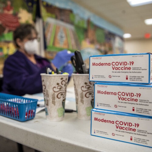 A nurse prepares a dose of the Moderna COVID-19 vaccine at a San Antonio senior center in March. A panel of advisers to the Food and Drug Administration will meet Thursday to review Moderna's booster shot.