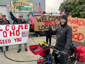 Quebecois long-distance cyclist Jean-Francois Bienvenue soaked in the warm welcome Monday in Port Angeles, having previously waited in a holding pattern in British Columbia until the border reopened. "It's crazy, everybody is so happy," the Los Angeles-bound cyclist said.