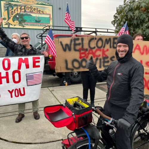 Quebecois long-distance cyclist Jean-Francois Bienvenue soaked in the warm welcome Monday in Port Angeles, having previously waited in a holding pattern in British Columbia until the border reopened. "It's crazy, everybody is so happy," the Los Angeles-bound cyclist said.