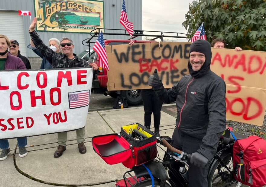 Quebecois long-distance cyclist Jean-Francois Bienvenue soaked in the warm welcome Monday in Port Angeles, having previously waited in a holding pattern in British Columbia until the border reopened. "It's crazy, everybody is so happy," the Los Angeles-bound cyclist said.