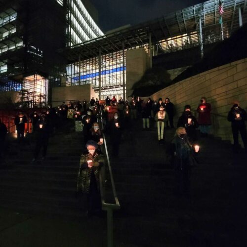People gathered at Seattle City Hall on December 21, 2021 to remember homeless people who died in the past year.