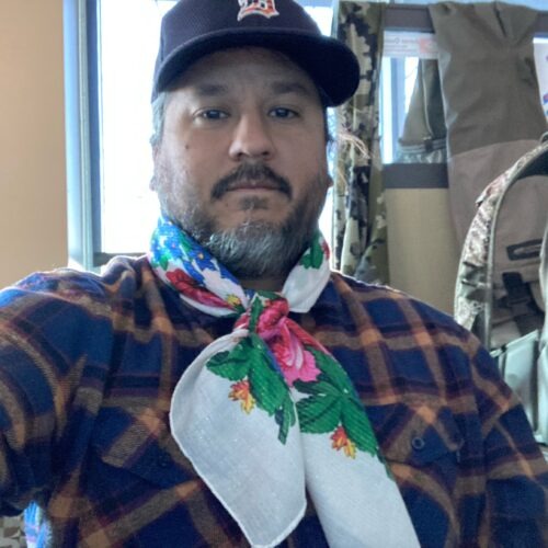 A Native American wears a Ukranian kukum scarf in solidarity