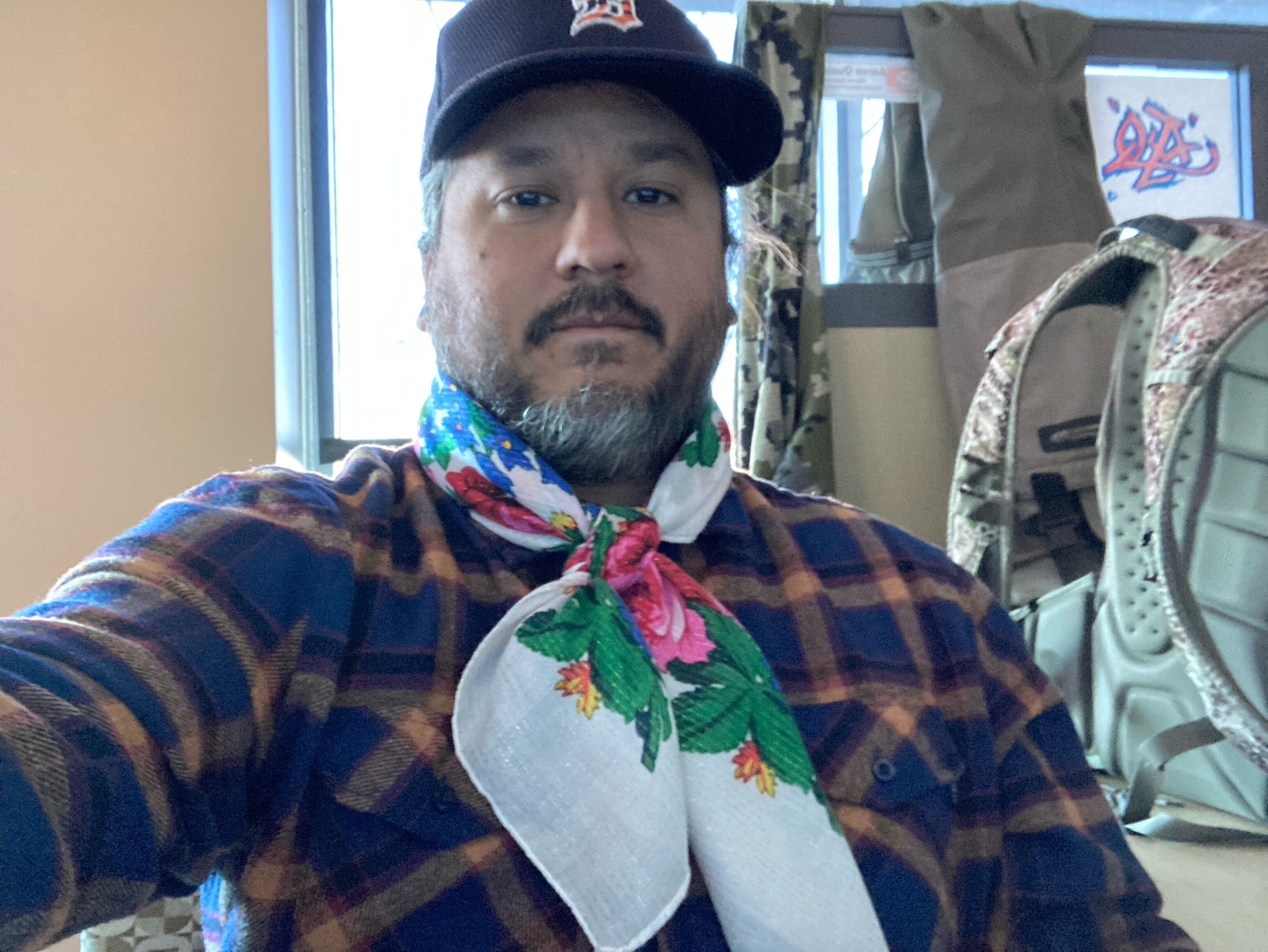 A Native American wears a Ukranian kukum scarf in solidarity