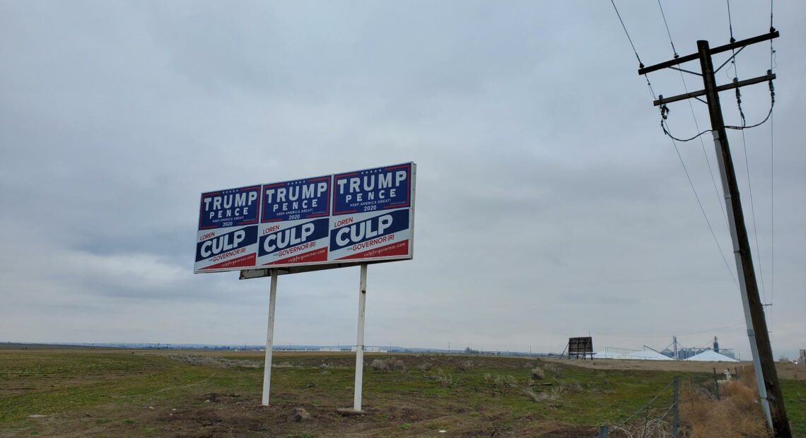 Billboards supporting Donald Trump and Loren Culp on highway