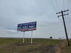 Billboards supporting Donald Trump and Loren Culp on highway