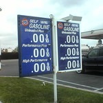 A sign with zero dollar amounts for gasoline, photo credit Drew Lawton via Flickr