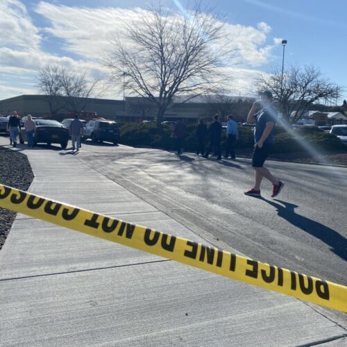 Crime scene tape blocks off the entrance to Richland's Fred Meyer. One person died and another was injured in a shooting at the store on Feb. 7.