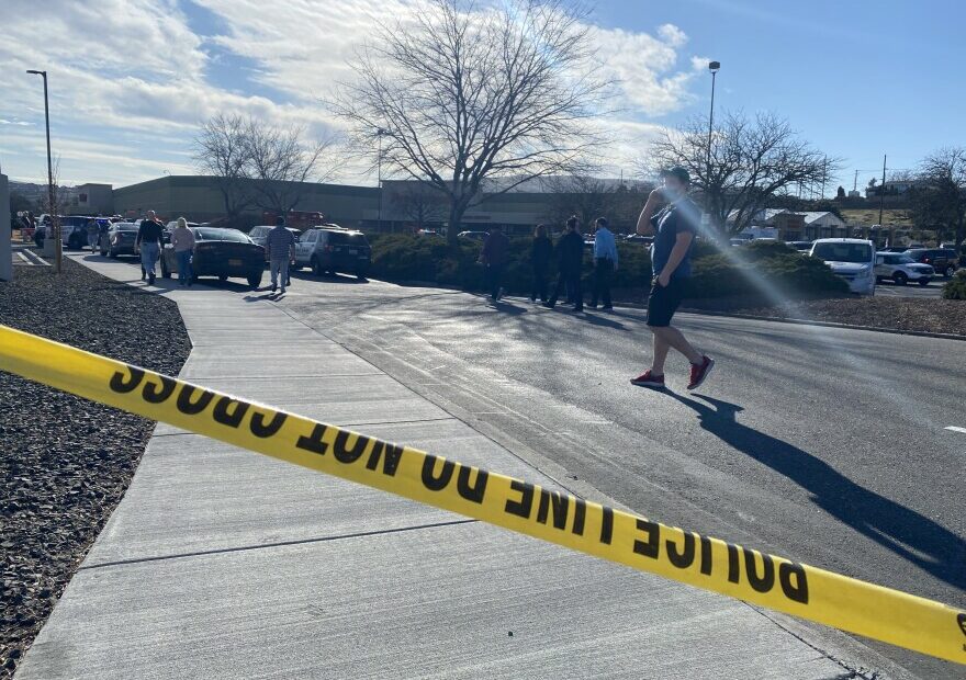 Crime scene tape blocks off the entrance to Richland's Fred Meyer. One person died and another was injured in a shooting at the store on Feb. 7.