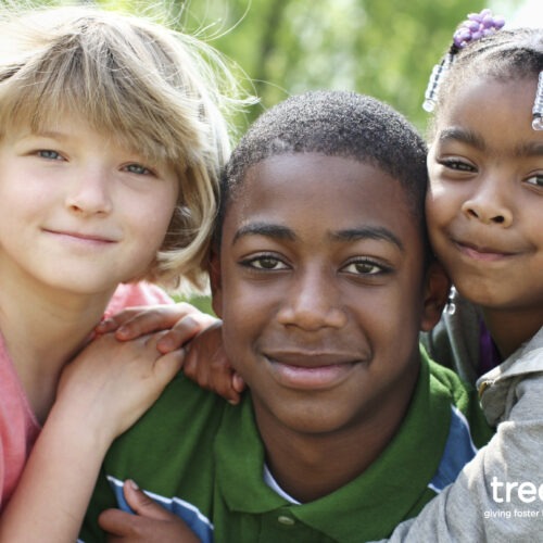 3 children hugging