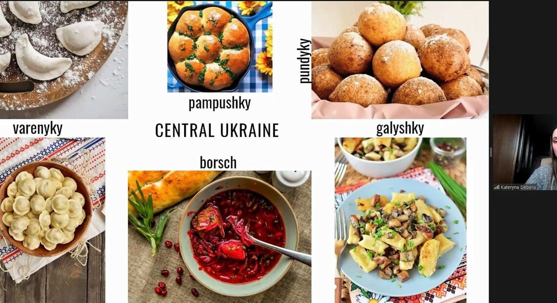 A screen shows brightly colored pastries, soup, and other dishes from Ukrainian culture.