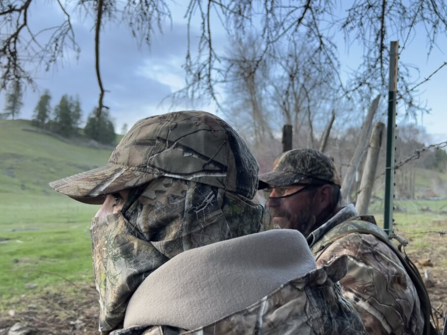 Keely Hopkins and Aaron Garcia hunt turkeys on a private property in Rice, Washington. Hopkins participated in a mentored turkey hunt, designed to teach people how to hunt.