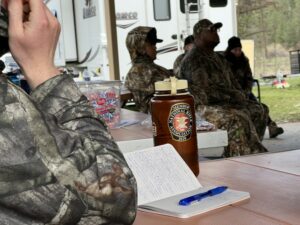 Hunters take notes during a workshop at the Mentored Spring Turkey Camp in Kettle Falls, Washington.