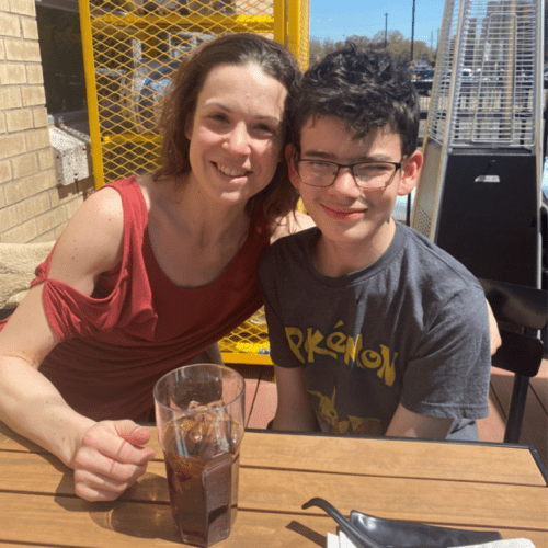 Robin Marie and her 13-year-old son Brennan pose for a photo earlier this spring at a restaurant in Texas. Marie was visiting her son who's living at an out-of-state residential treatment facility paid for by his local school district and the state.