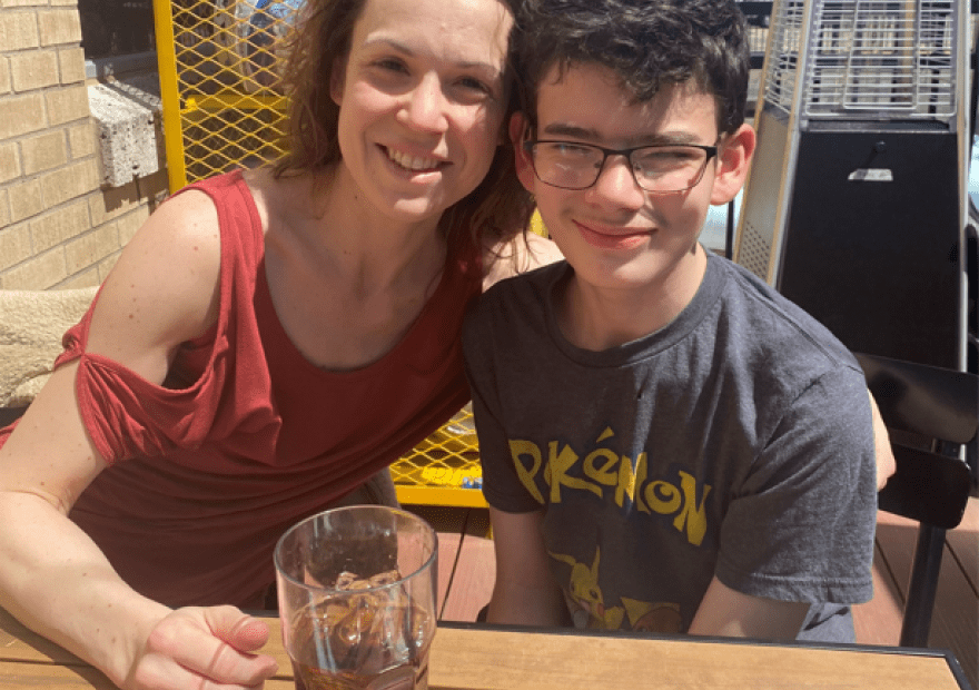 Robin Marie and her 13-year-old son Brennan pose for a photo earlier this spring at a restaurant in Texas. Marie was visiting her son who's living at an out-of-state residential treatment facility paid for by his local school district and the state.